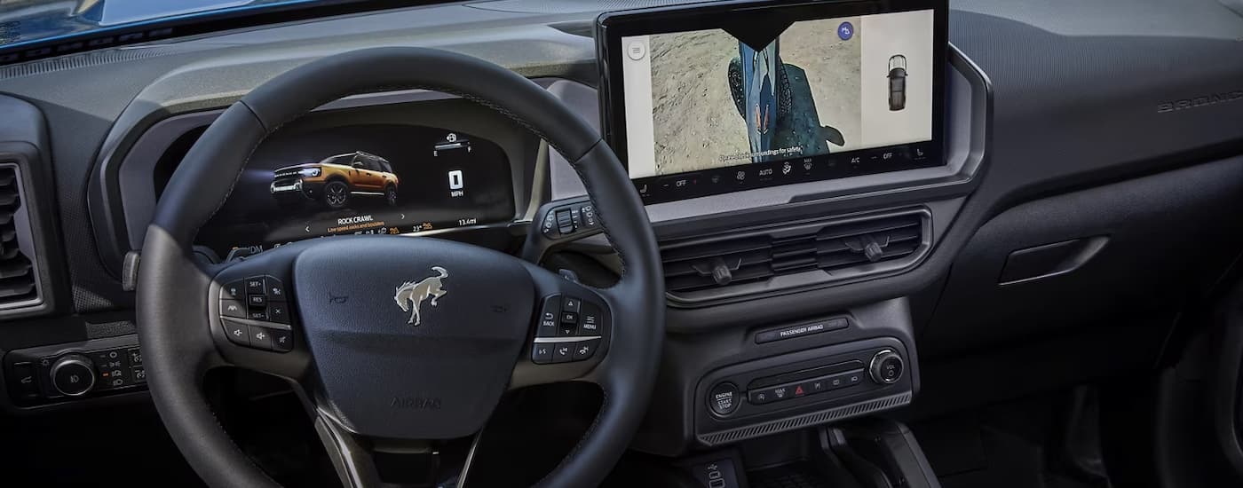 Steering wheel and infotainment screen in a 2025 Ford Bronco Sport