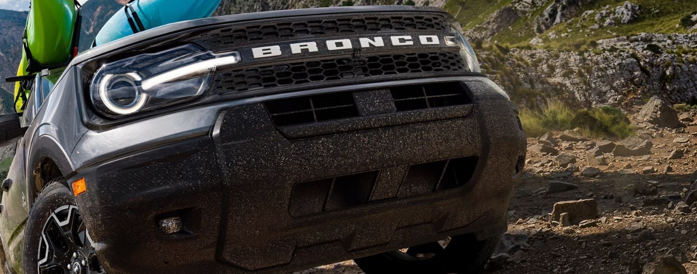 Close up of a grey 2026 Ford Bronco Sport with kayaks on the roof.
