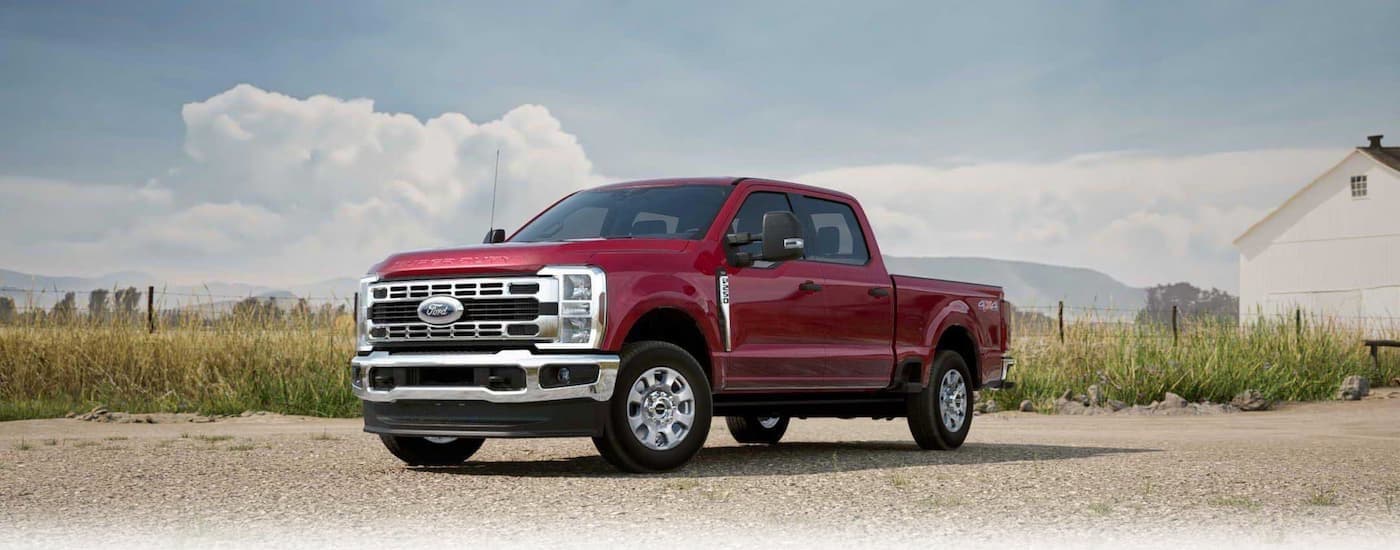 A red 2025 Forf F-250 parked during the day.